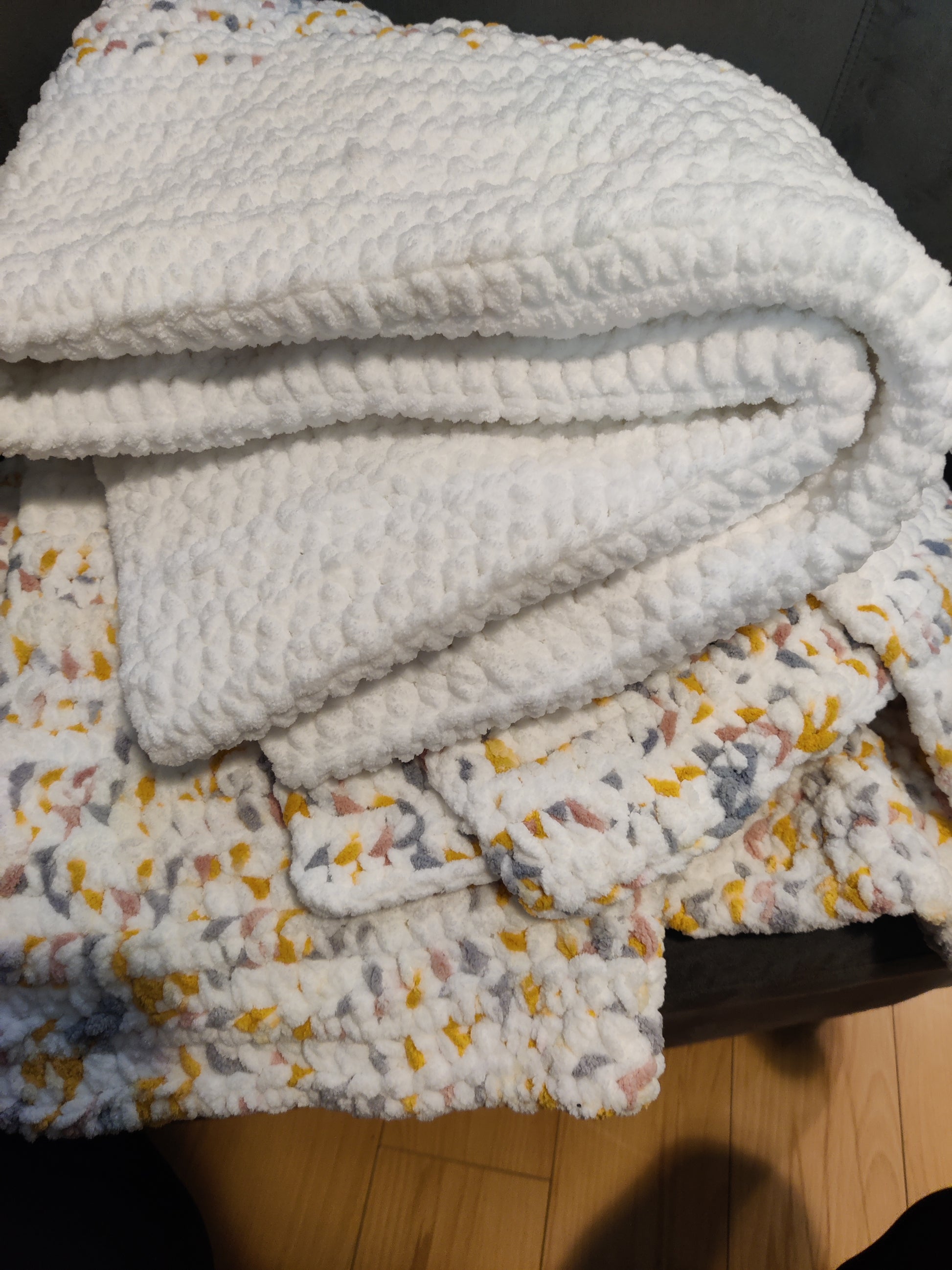 White, pink, yellow, gray, crochet blanket 